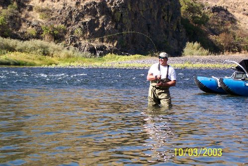 Albuquerque, New Mexico fly fisherman Don Sanchez is into a big Steelhead during his trip to the Grande Rhonde in Washington.