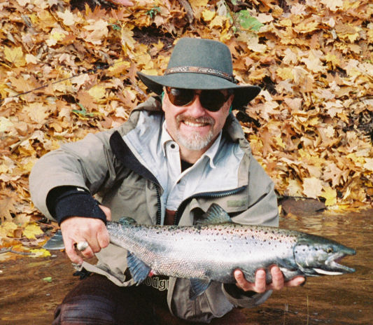 Kevin Veator from Wilmington, MA. proudly holding up a wild Atlantic salmon that he caught on his Elkhorn 10 Ft./7 Wt. on a Lake Ontario tributary November 2005.