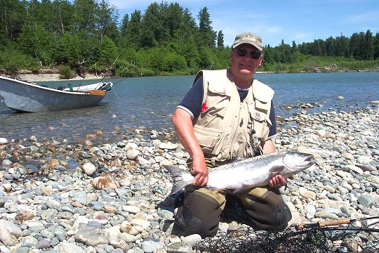 John Ingals with a bright spring salmon taken May 28th 2005 in the Kitimat River on an olive leech pattern with a # 4 hook.