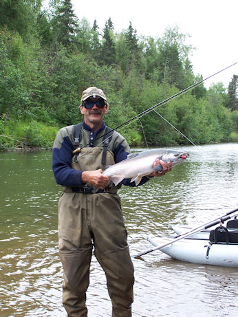 Ard Stetts, rewarded with a nice Sockeye - his pontoon boat in the background.