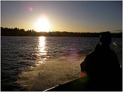 Jason Lundgren motors back from a day spent fly fishing Puget Sound waters.