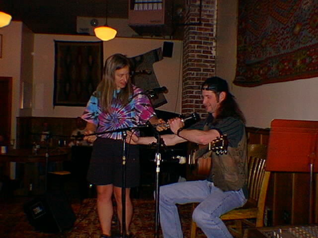Emcee Sue Tjardes with Rick Gerth