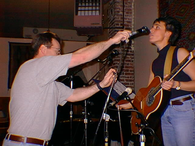 Tom setting mic for Vickey Lyn