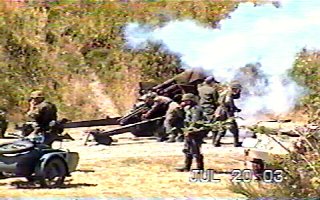 German Gun crew firing on Allied Beachhead