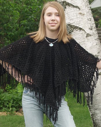 Hand knitted poncho