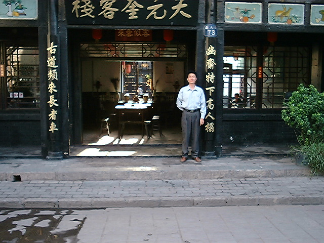 Luo before our Hotel