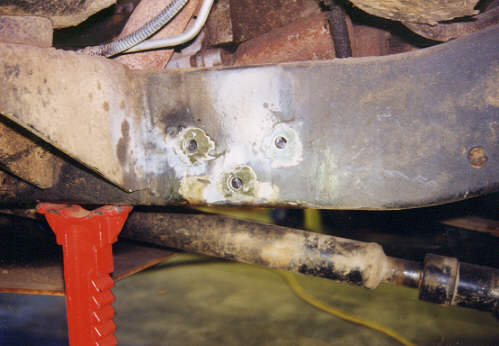 original bracket gone, holes driled