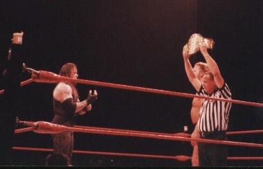 Undertaker, as WWF Champion, vs Big Show.