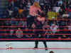 Kane_Chokeslamming_Chris_Jericho_1.jpg (12478 bytes)