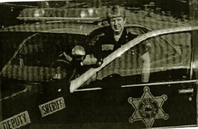 Deputy Sheriff Connie Dent going on patrol in Boone County at her sisters home in Bandytown 1997.