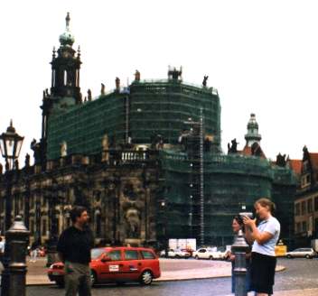 Nadine videoing Patrick. Behind is much scaffolding