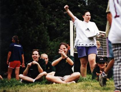 Petra, roving ground announcer and official