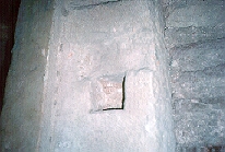 One jamb of the postern showing the  'putlog' holes