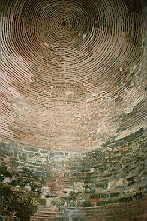 Inner roof and upper walls of lower story of wall tower