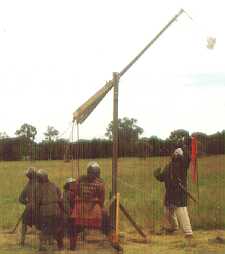 B. The pivot bar and sling in action.