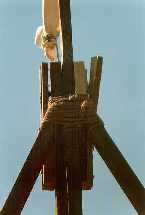 C. The resultant spilt in the pivot support beam caused by inferior materials being used and the stress placed on the whole pivot