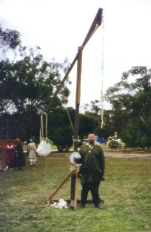 A. Sven standing in front of Vlachernai's Traction Trebuchet (Version 2.).