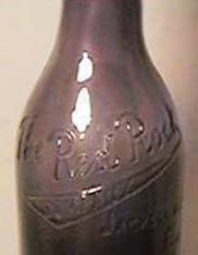 Close-up of amethyst bottle