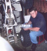 Me studying a magazine in the garage